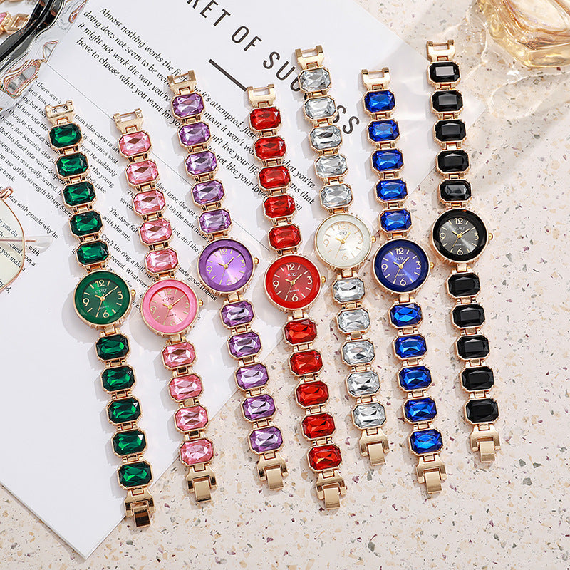 Women’s Gold Bracelet Quartz Watch with Black Crystal Dial